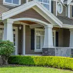 Freshly painted coastal-style home exterior in neutral tones showing ideal results during the best time to paint a home exterior in Fort Myers