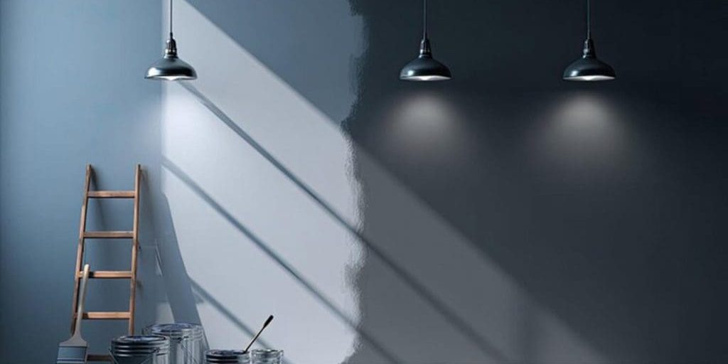 Fresh interior paint finishes being applied in a high-use room, showing how long do paint finishes last in high-use rooms with proper preparation and lighting.